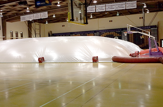 using desiccant technology to dry a gym floor from the top